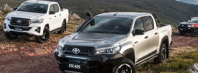 2018 Toyota HiLux Rugged X (right), Rogue and Rugged (rear)