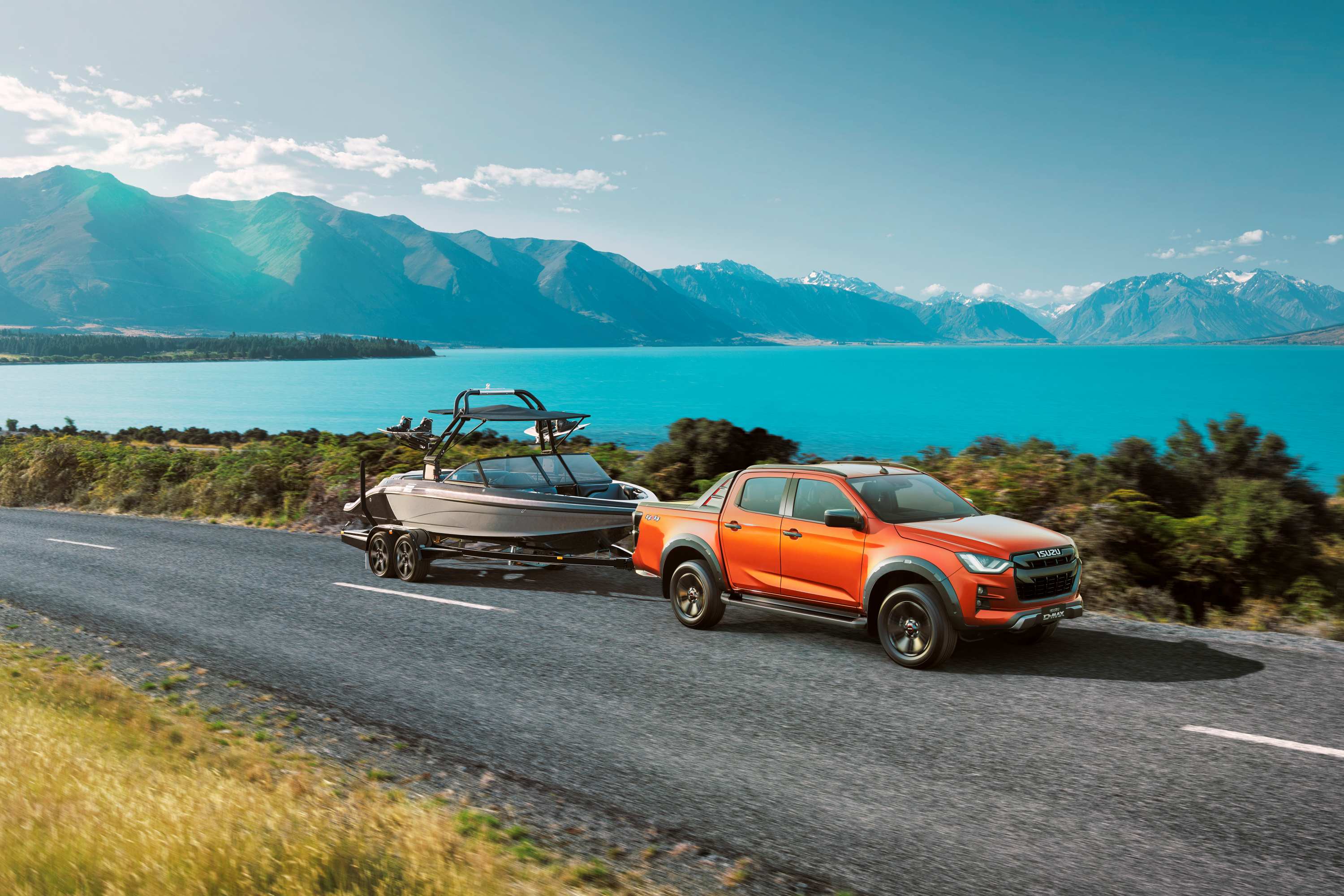 Isuzu D-MAX 21MY Towing the Line with Boat 4x4 X-TERRAIN Volcanic Amber