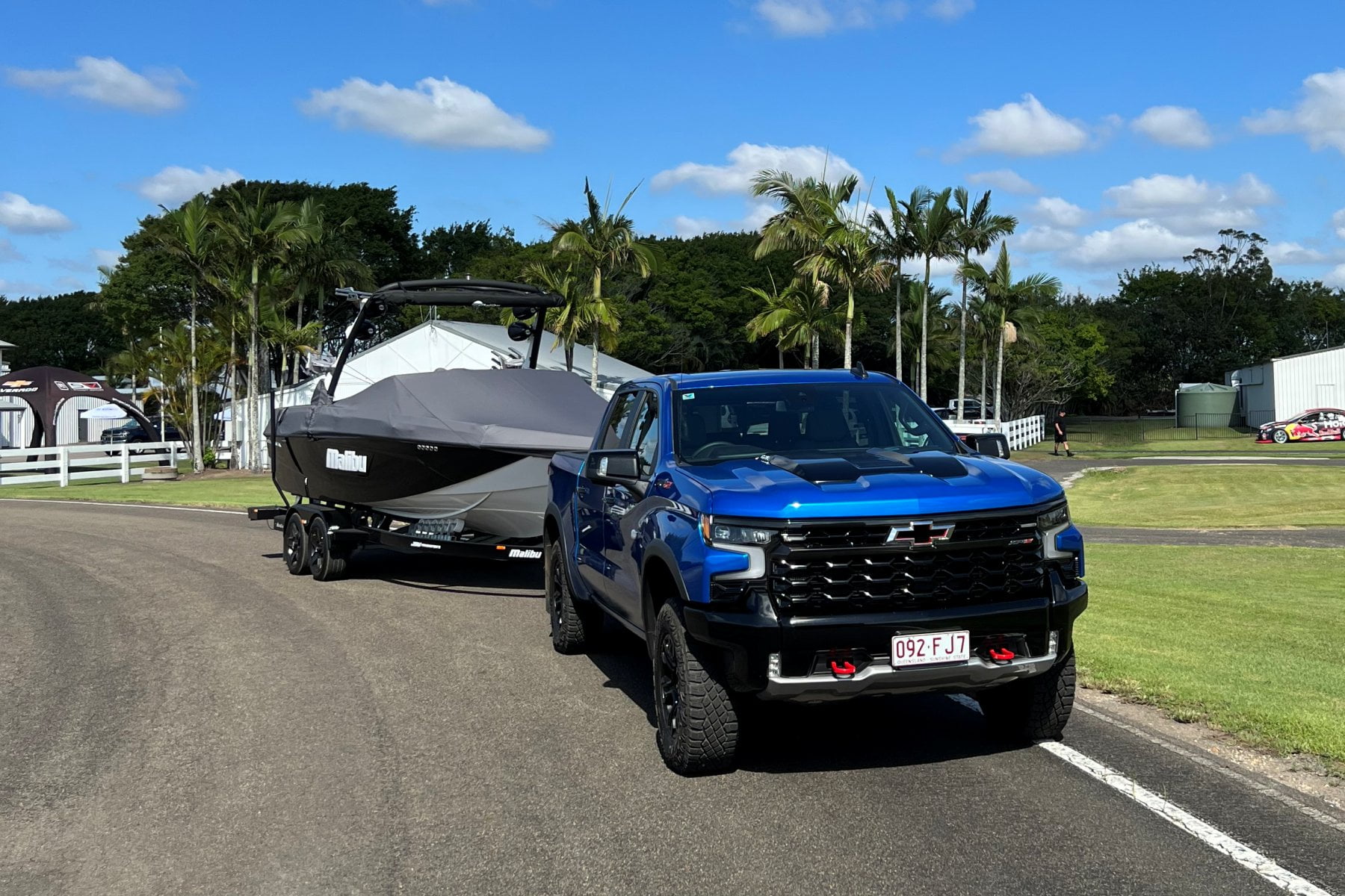 2023 Chevrolet Silverado 1500 models ZR2 towing a boat