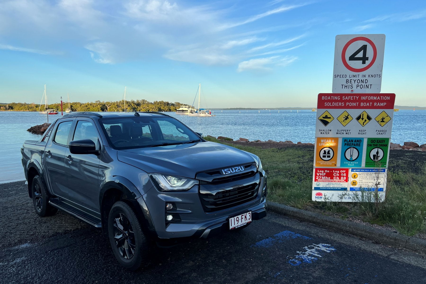 2023 Isuzu D-Max X-Terrain front quarter on boat ramp sunrise 2