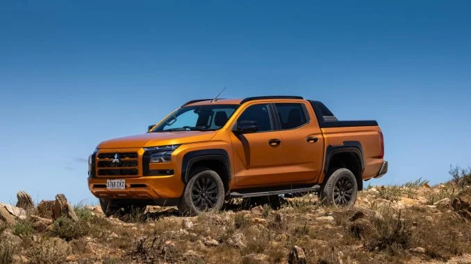 2024 Mitsubishi Triton GSR Yambuki Orange front quarter 1