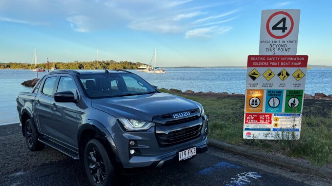 2023-Isuzu-D-Max-X-Taerrain-front-quarter-on-boat-ramp-sunrise-2