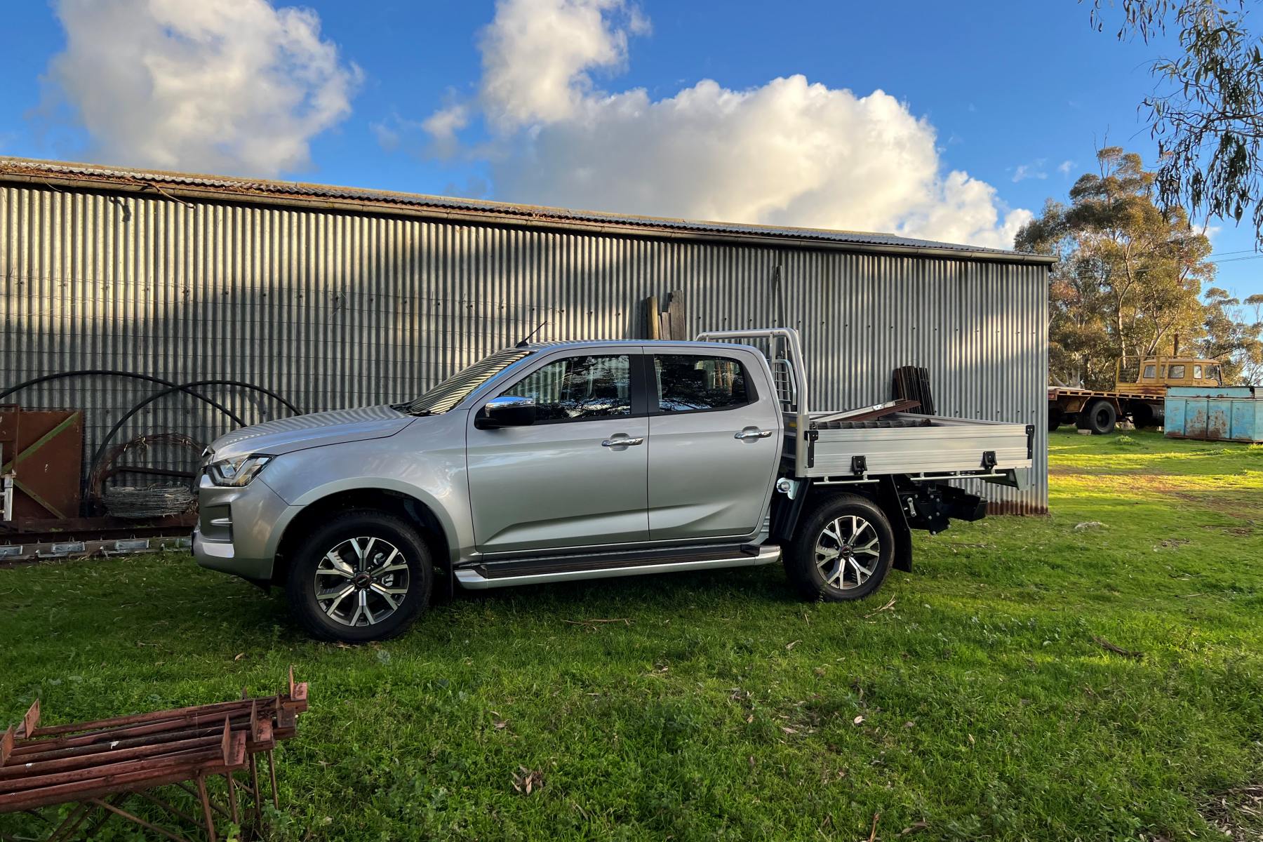 Isuzu D-Max LS-U Dual Cab Trayback 4WD Ute at farm profile