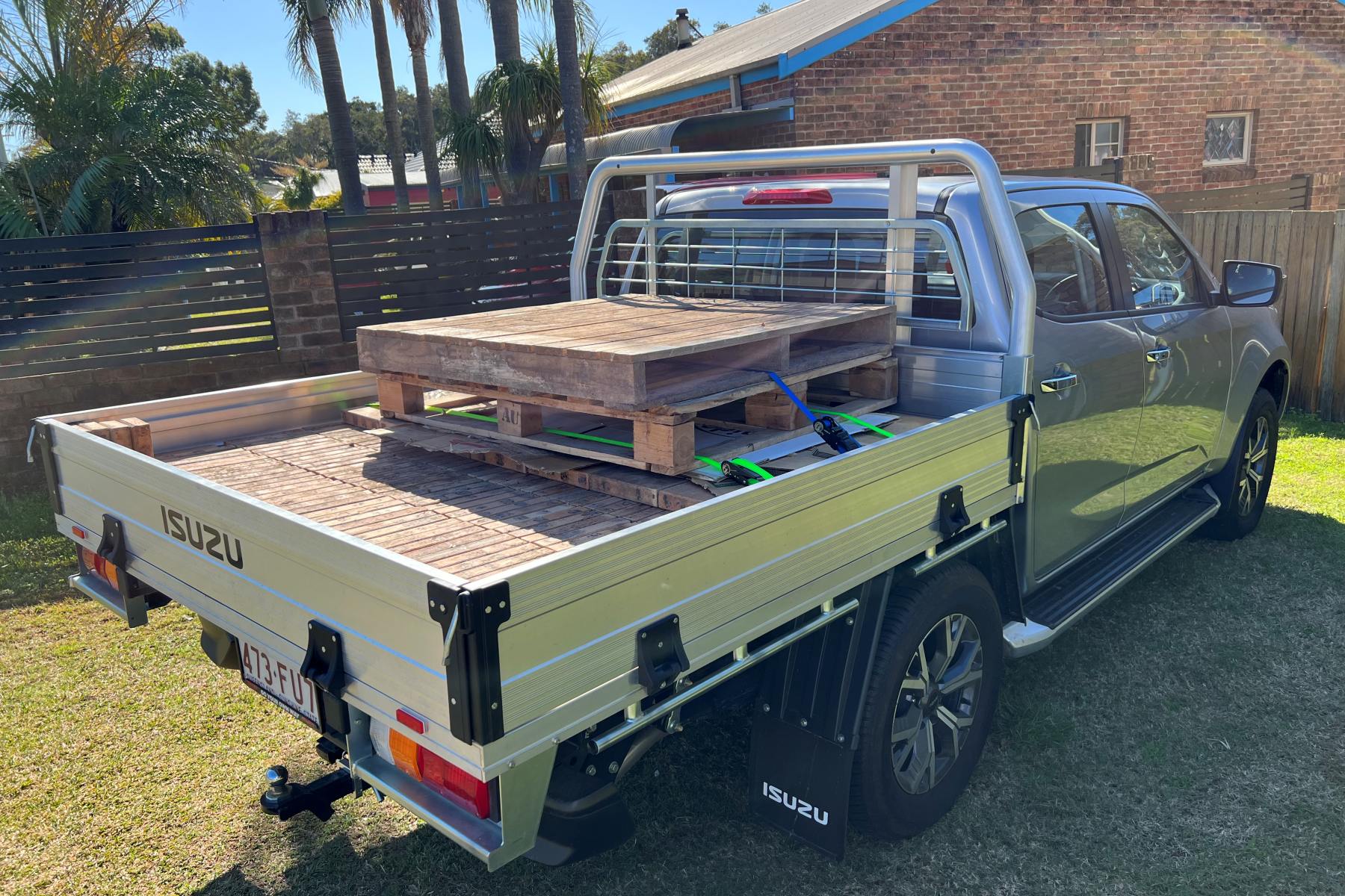 Isuzu D-Max LS-U crew Cab Trayback 4WD Ute loaded with pavers 3