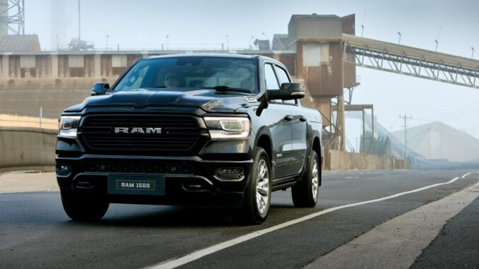 RAM 1500 Laramie Sport exterior front quarter driving