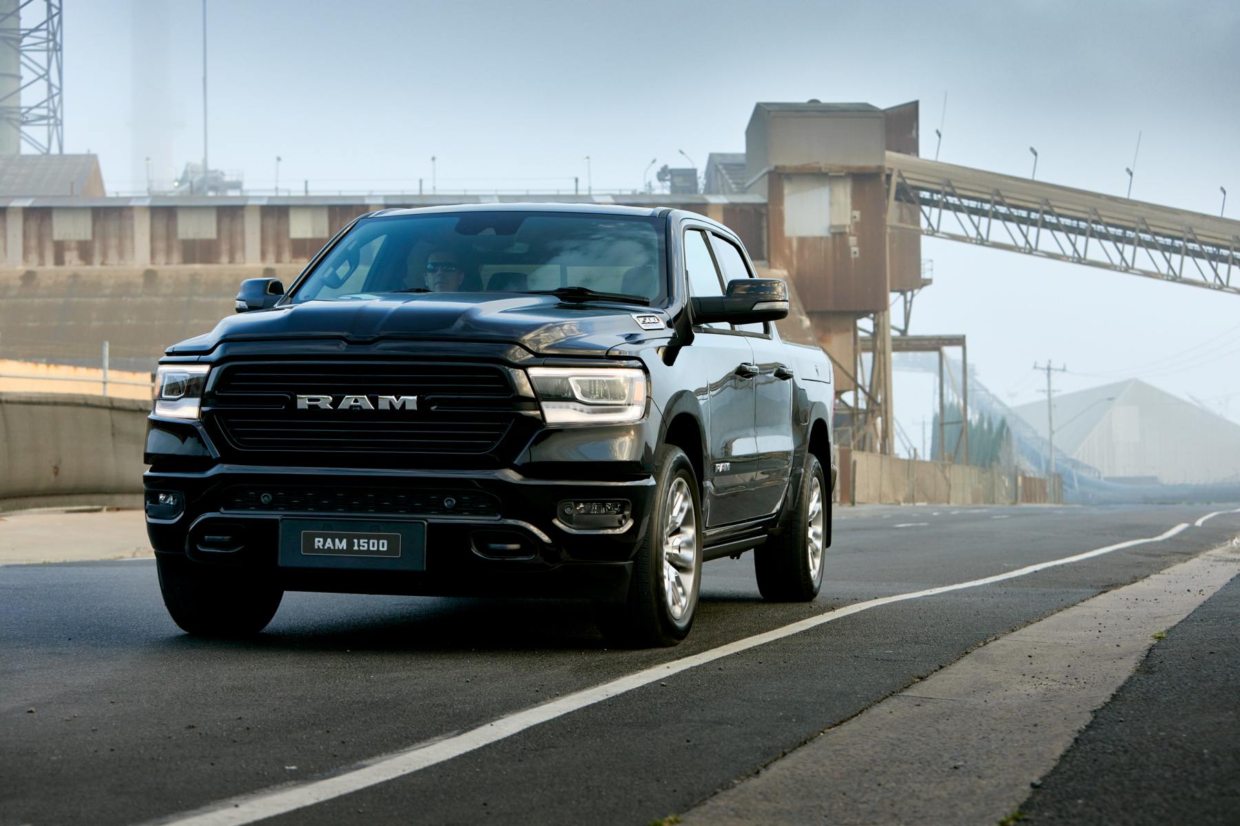 RAM 1500 Laramie Sport exterior front quarter driving